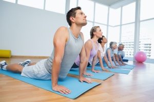 group of yoga people helping teacher find places to teach yoga