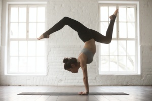 women holding a pose in Tadasana