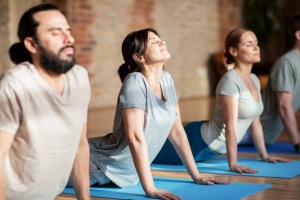 group doing upward facing dog