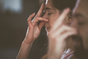 women taking lesson in breathing to  Reduce Anxiety