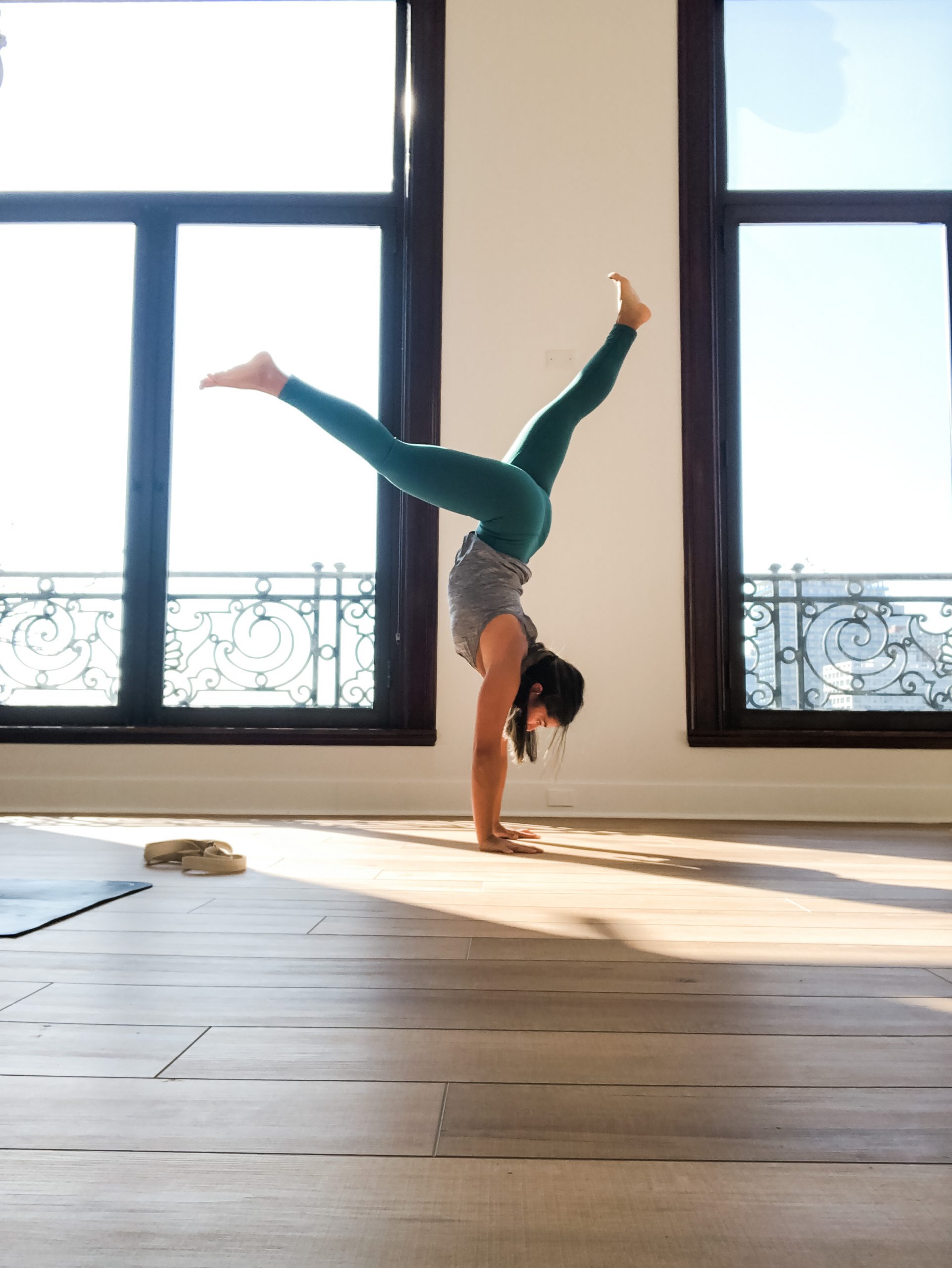 Girl moving into handstand