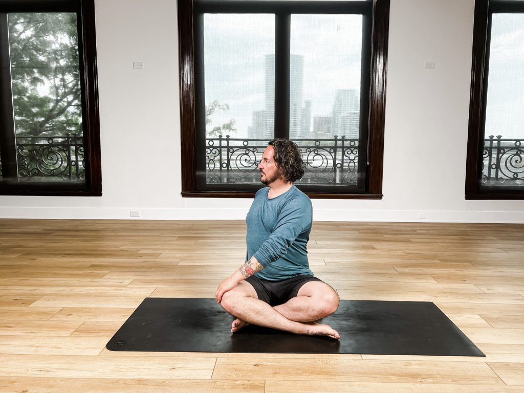 Man in a seated spinal twist