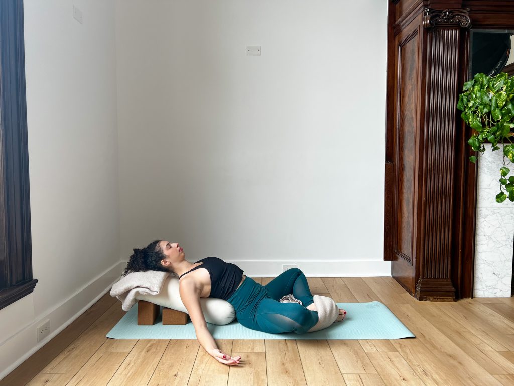 Girl in Supta Baddha Konasana