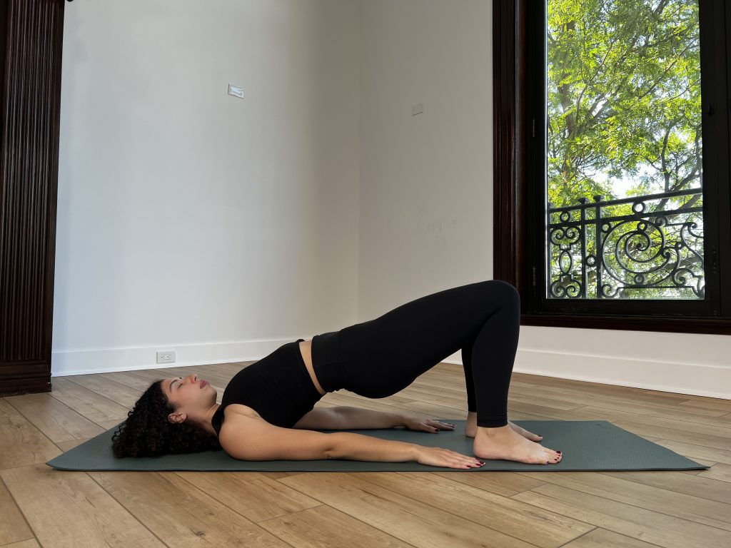 A girl in bridge pose