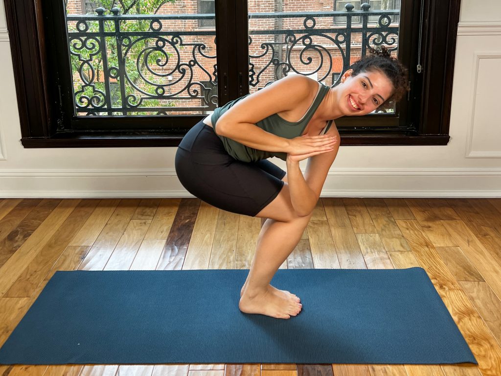 Girl in revolved chair pose