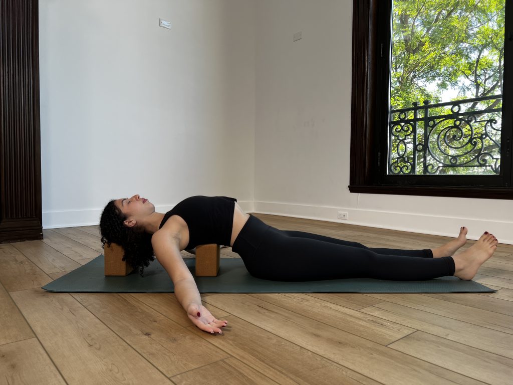 A girl in supported fish pose