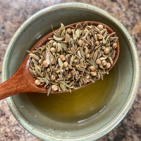 Ayurvedic allergy tea made from cumin, coriander, and fennel seeds